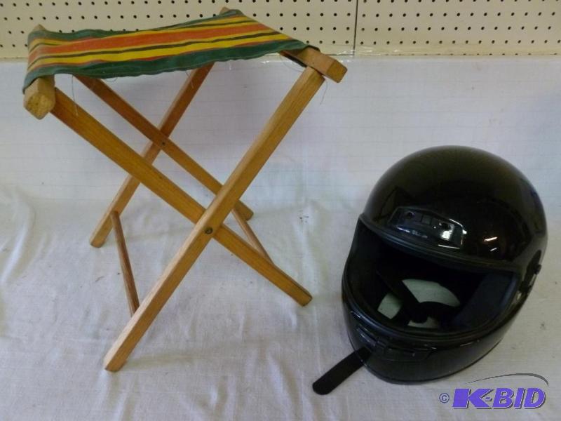 lot 129 image: This lot consists of a motorcycle helmet and ...