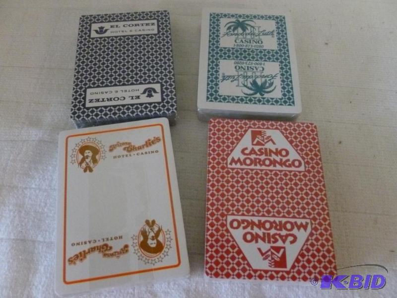lot 201 image: Lot of four decks of good playing cards, bran...