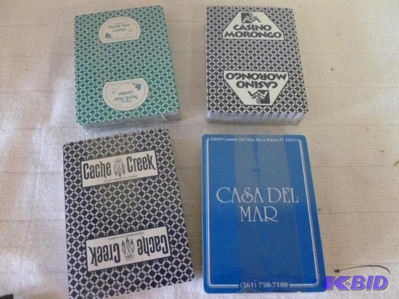 lot 202 image: Lot of four decks of good playing cards, bran...