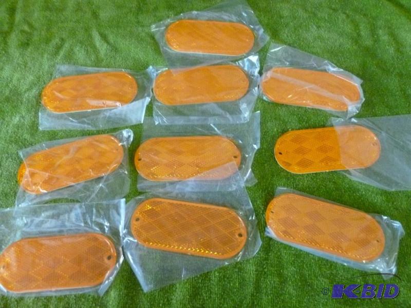 lot 210 image: Lot of ten SAE A.00 D.O.T 1 reflectors that m...