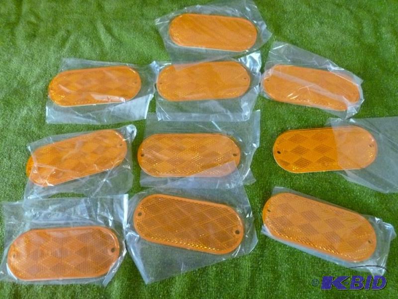 lot 212 image: Lot of ten SAE A.00 D.O.T 1 reflectors that m...