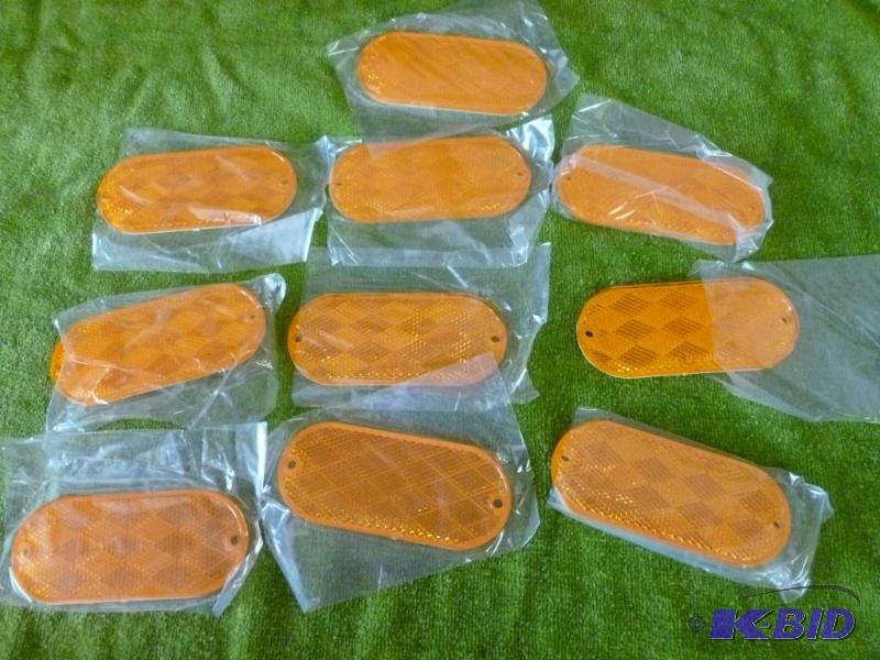 lot 216 image: Lot of ten SAE A.00 D.O.T 1 reflectors that m...