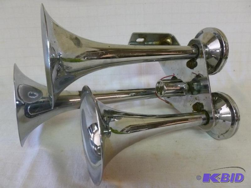 lot 23 image: A set of three large chrome plated metal truc...