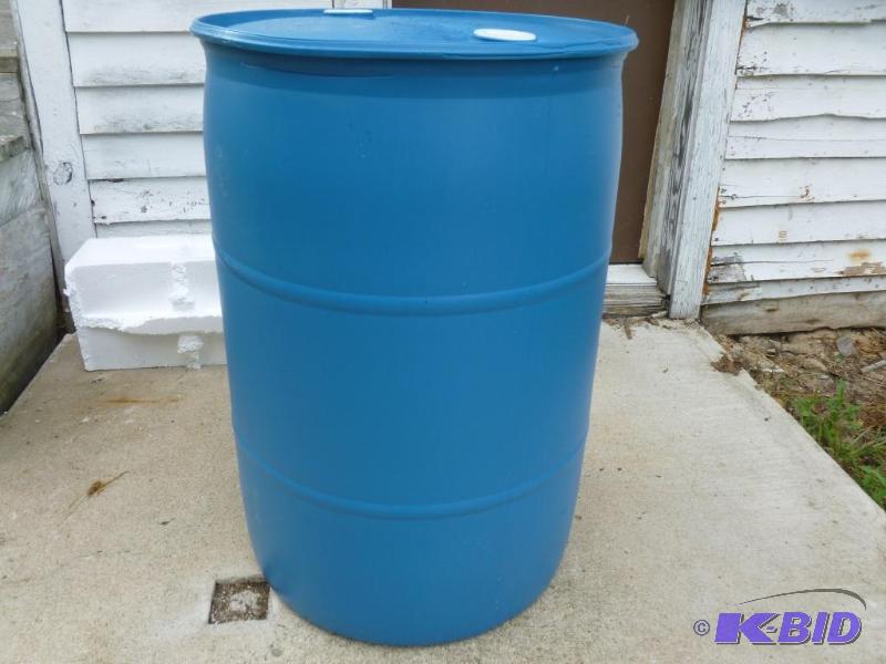 lot 245 image: Large 55 gallon plastic drum, comes with two ...