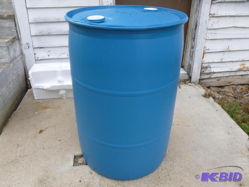 lot 247 image: Large 55 gallon plastic drum, comes with two ...