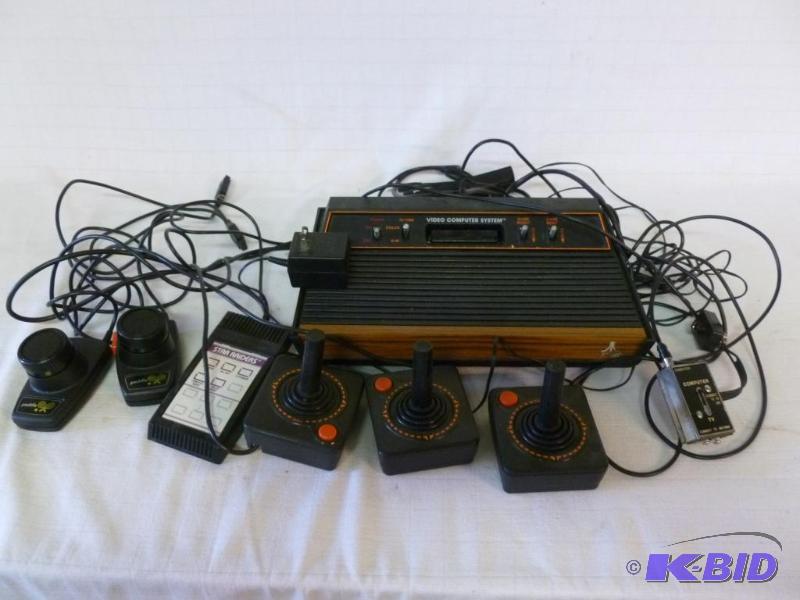 lot 3 image: Atari game console model CX-2600A, comes comp...