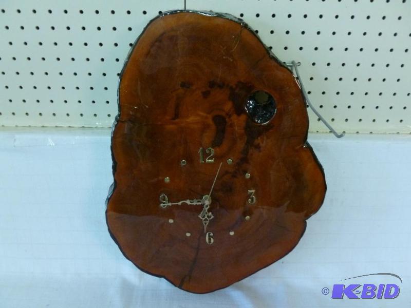 lot 62 image: Large polished wood slab battery operated wal...
