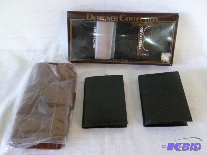 lot 95 image: Lot of four new wallets that includes a Lane ...
