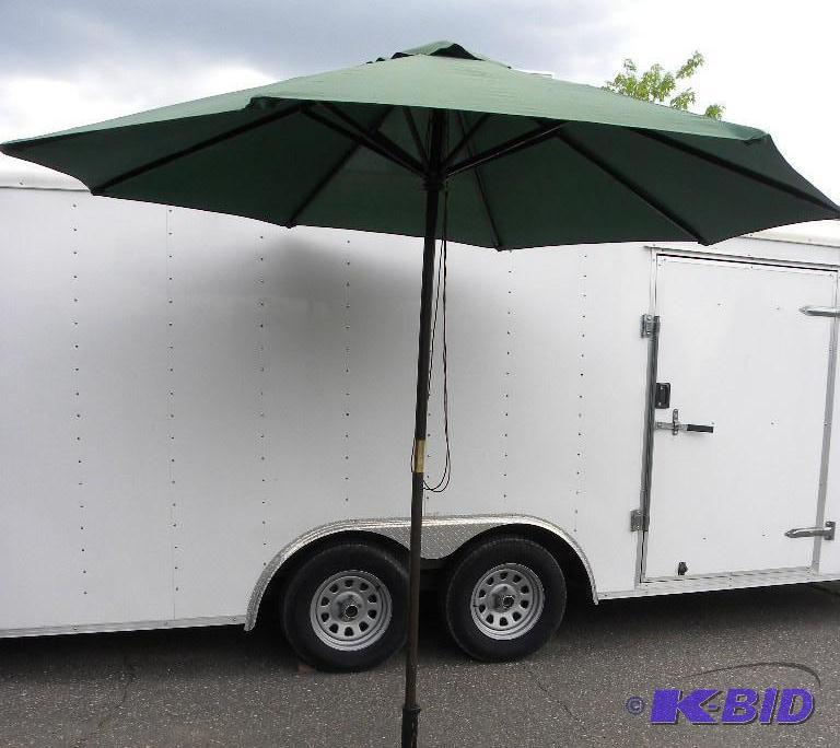 lot 57 image: Pair of 9-ft Market Umbrellas, hunter green, ...