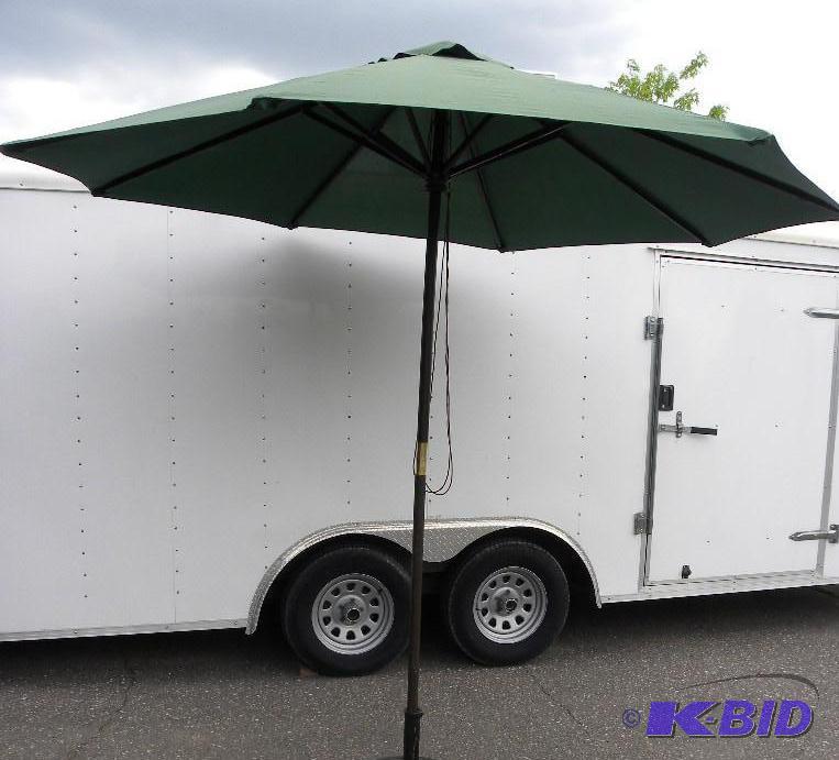 lot 58 image: Pair of 9-ft Market Umbrellas, hunter green, ...