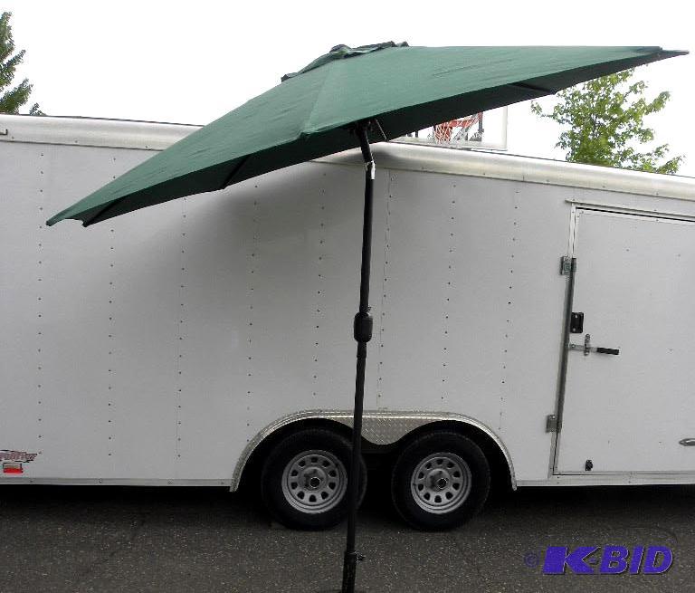 lot 68 image: 9 Deluxe Market Umbrella, green, 8 steel rib...