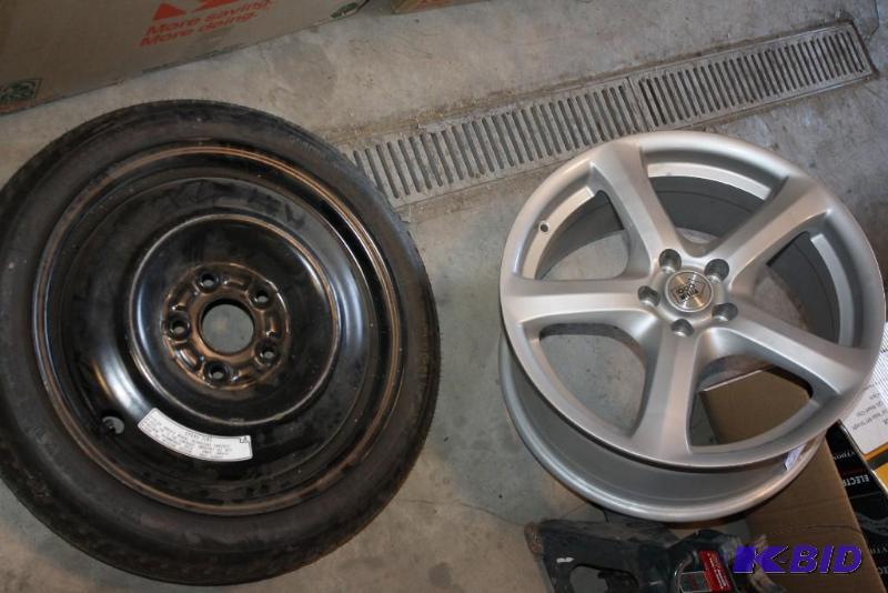 lot 173 image: Lot of (2) Items - Including (1) Spare Tire -...