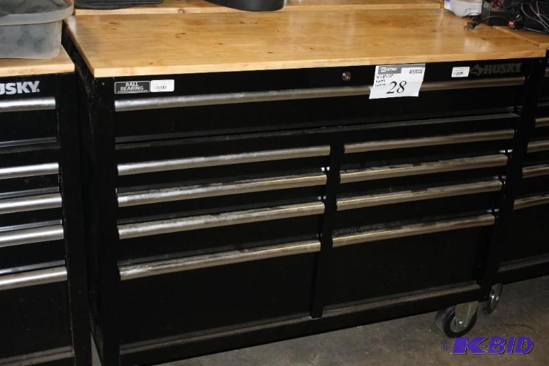 lot 28 image: Husky Brand 46" W 9-Drawer Black Out Mob...