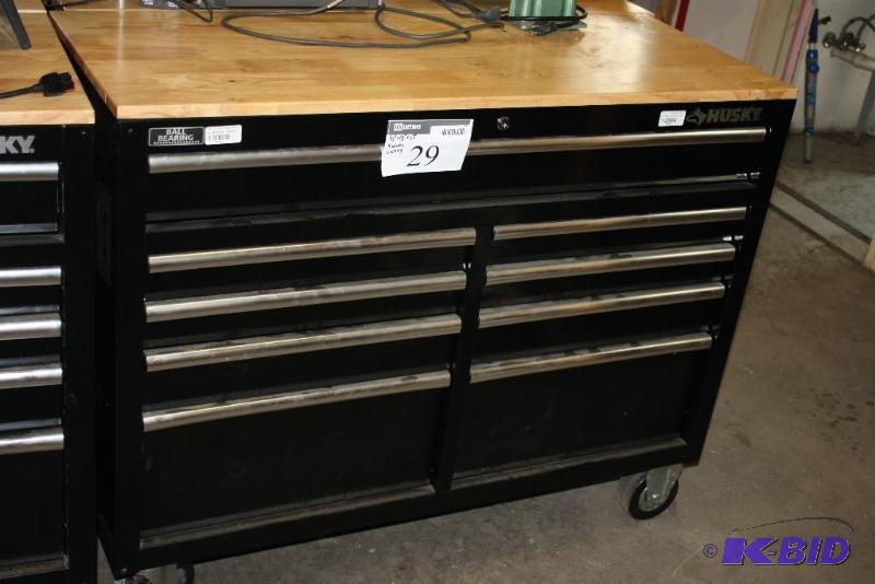 lot 29 image: Husky Brand 46" W 9-Drawer Black Out Mob...