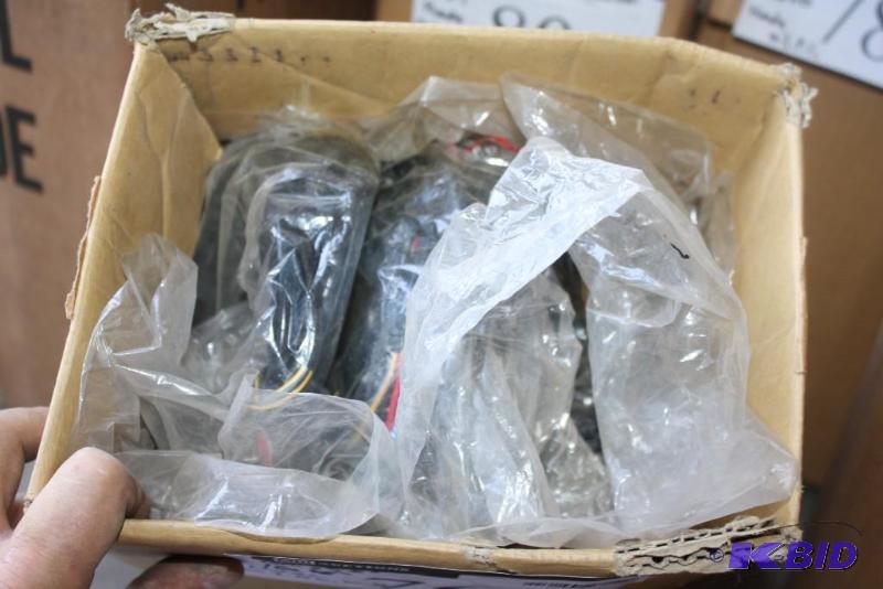 lot 76 image: Box lot of (16) Honda brand Outboard Instrume...