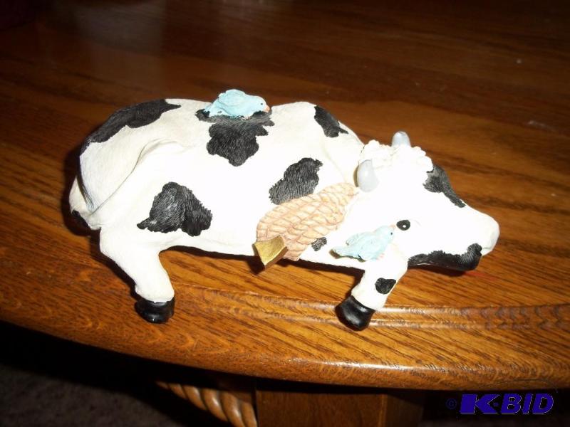 Music Box Cow resting...