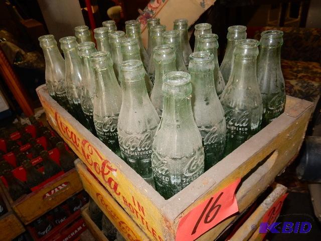 24 Vintage GLASS Coke bottles.. Names of town...