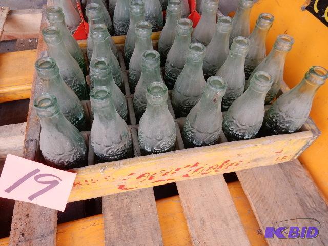 24 Vintage GLASS Coke bottles.. Names of town...