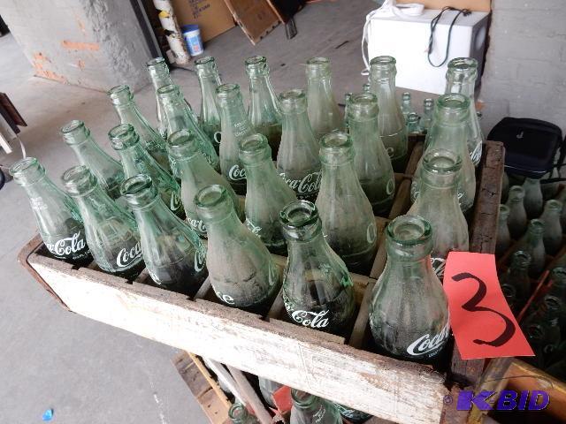 24 Vintage GLASS Coke bottles.. Names of town...