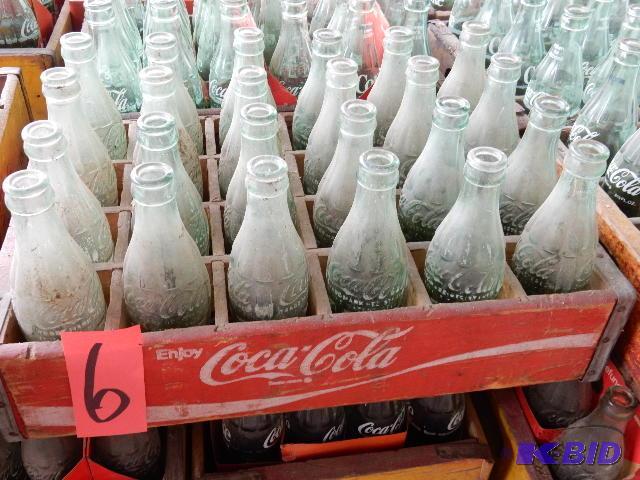 24 Vintage GLASS Coke bottles.. Names of town...