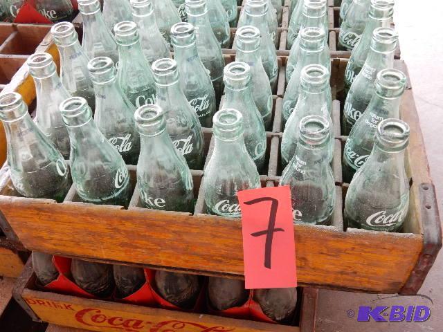 24 Vintage GLASS Coke bottles.. Names of town...