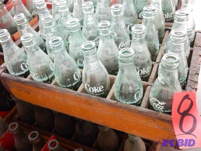 24 Vintage GLASS Coke bottles.. Names of town...
