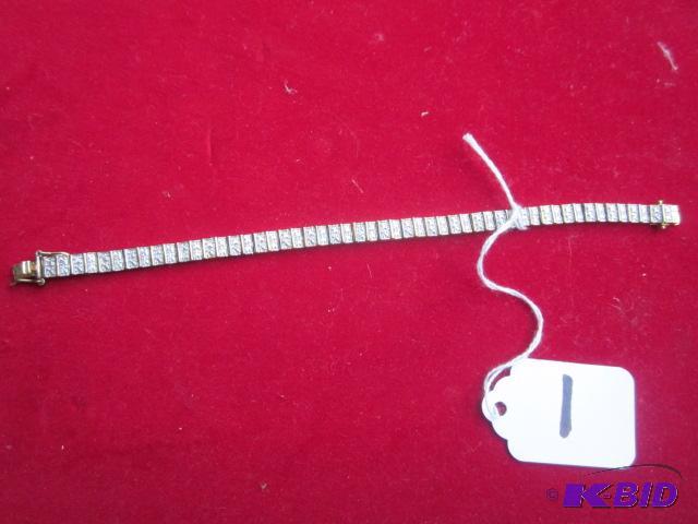 Vintage 8 inch gold colored sterling and ston...