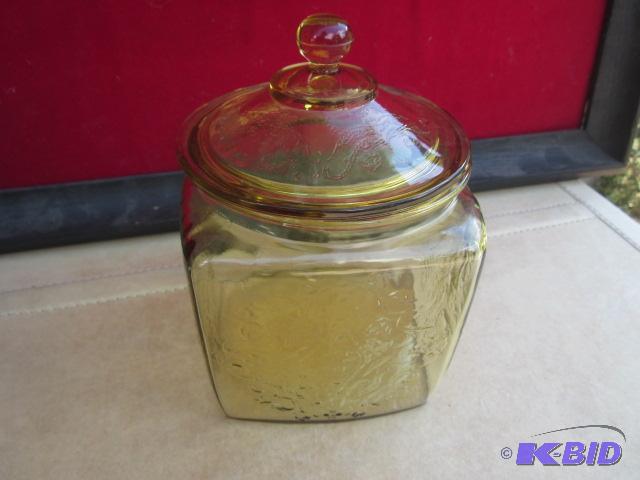7 inch yellow depression glass lidded jar.&nb...