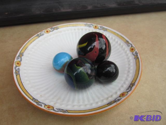 Lot of (4) large marbles 1 inch1 and 34 inc...