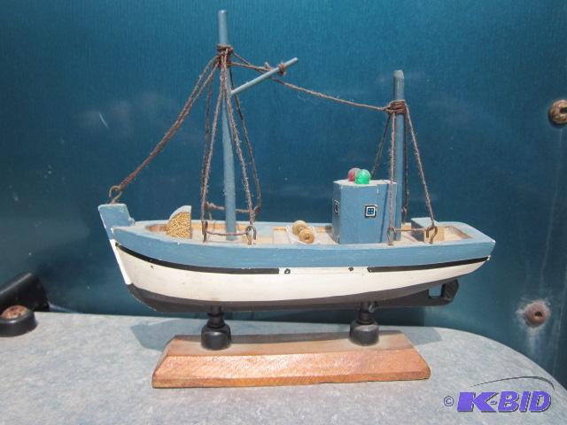 Vintage small hand painted wooden ship on woo...