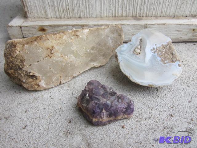 Lot of (3) rocks, including quarts, amethyst,...