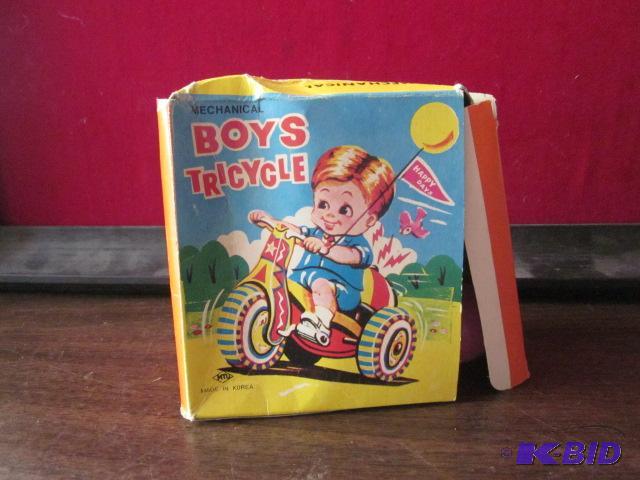 Vintage Mechanical boys tricycle tin toy, in ...
