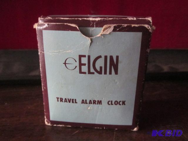 Elgin #8999 color brown travel alarm clock, w...
