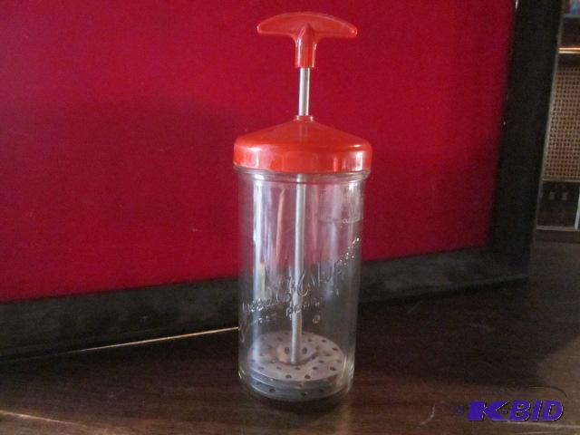 Vintage old glass speed whipper, bakelite top...