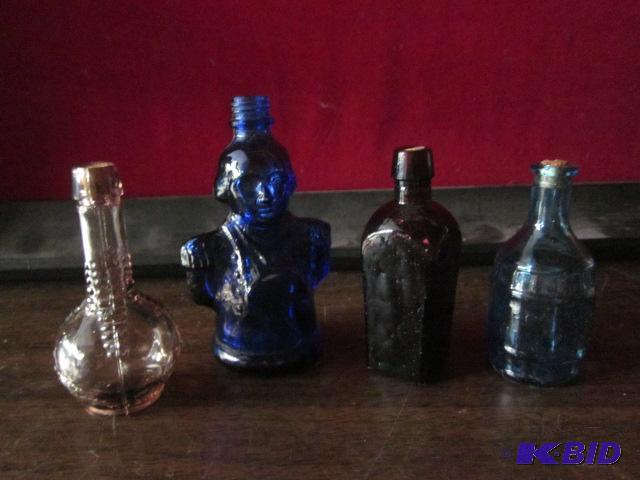 Lot of (4) vintage liquor bottle (all empty),...