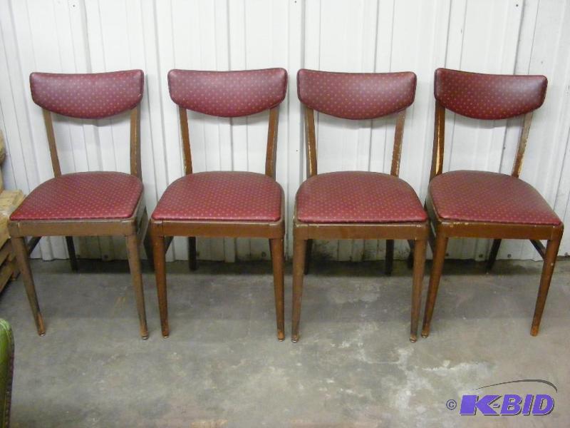4 red wooden chairs