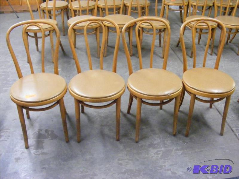 4 Tan Wooden Chairs