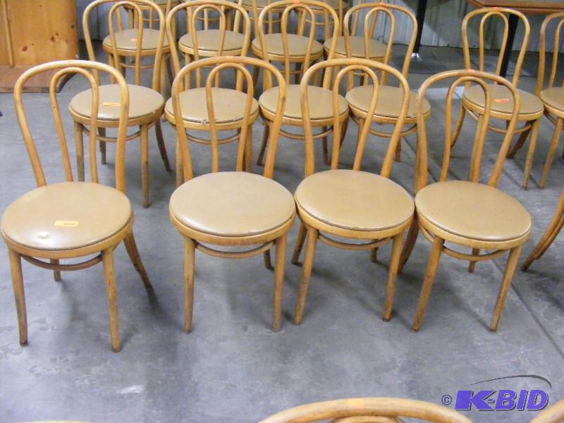 4 Tan Wooden Chairs