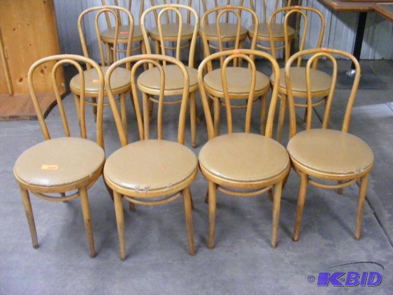 4 Tan Wooden Chairs
