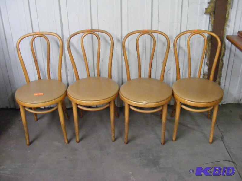 4 Tan Wooden Chairs
