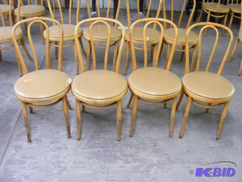 4 Tan Wooden Chairs