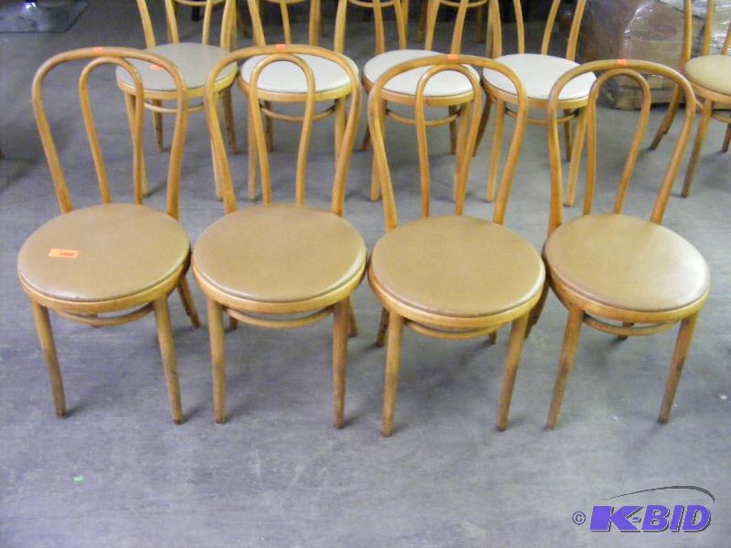 4 Tan Wooden Chairs