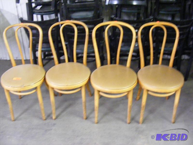 4 Tan Wooden Chairs