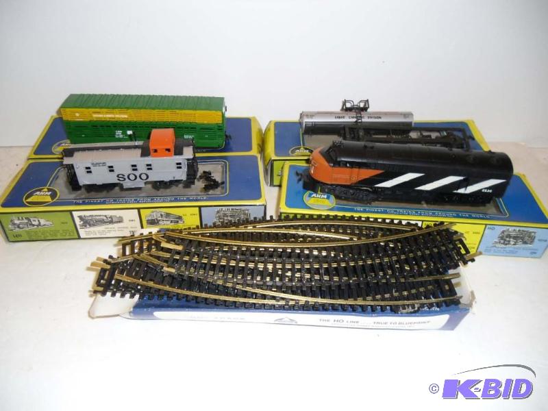 lot 20011 image: Vintage AHM Trains HO Scale Engine Tank Stock Car Caboose in Boxes