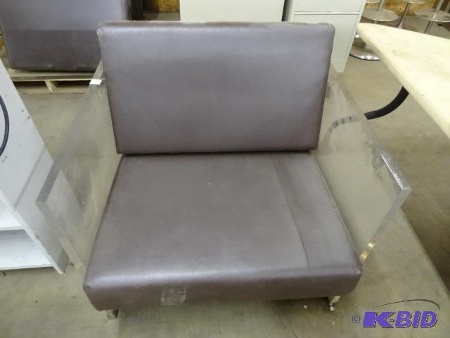 lot 19 image: Plexiglass Chair with Removable Cushions. The...