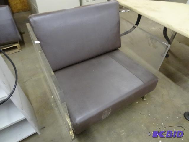 lot 21 image: Plexiglass Chair with Removable Cushions. The...