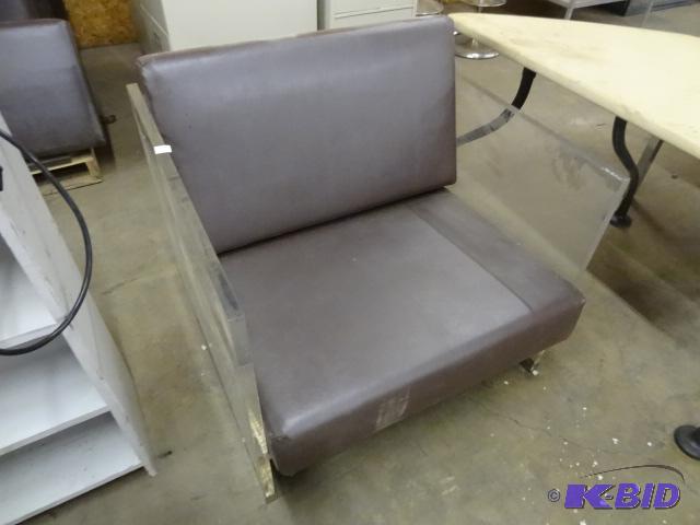 lot 22 image: Plexiglass Chair with Removable Cushions. The...