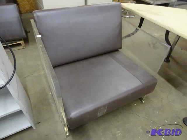 lot 24 image: Plexiglass Chair with Removable Cushions. The...