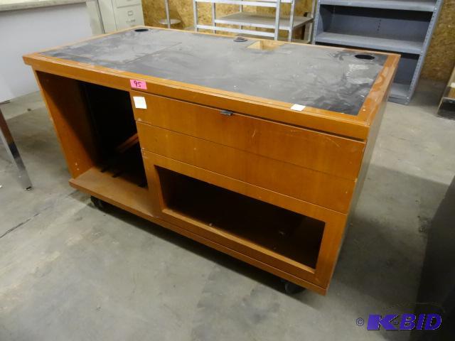 lot 68 image: Media Cabinet on Wheels. 52 x 27 x 31...