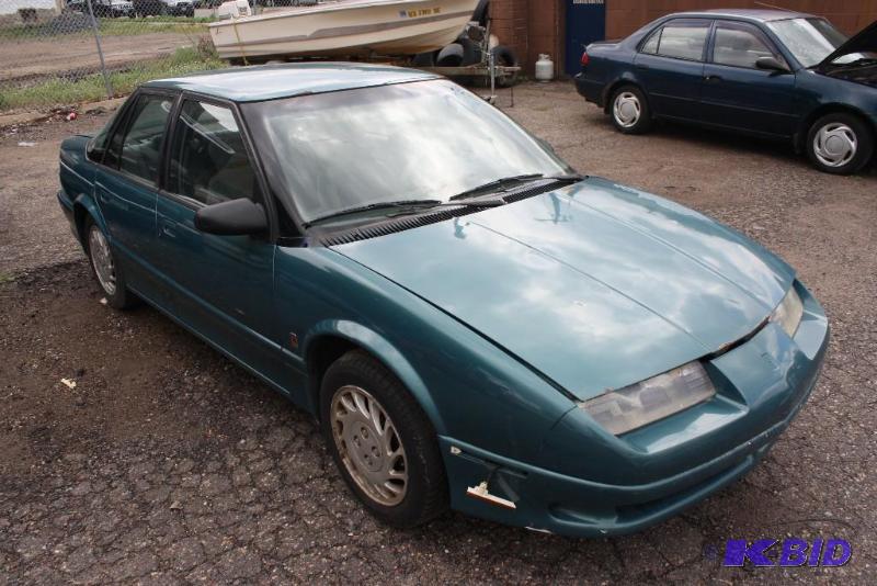 lot 27 image: 1994 SATURN SL2 VIN 1G8ZK5574RZ360783, Miles...